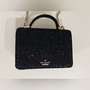 Kate Spade black glitter handbag.